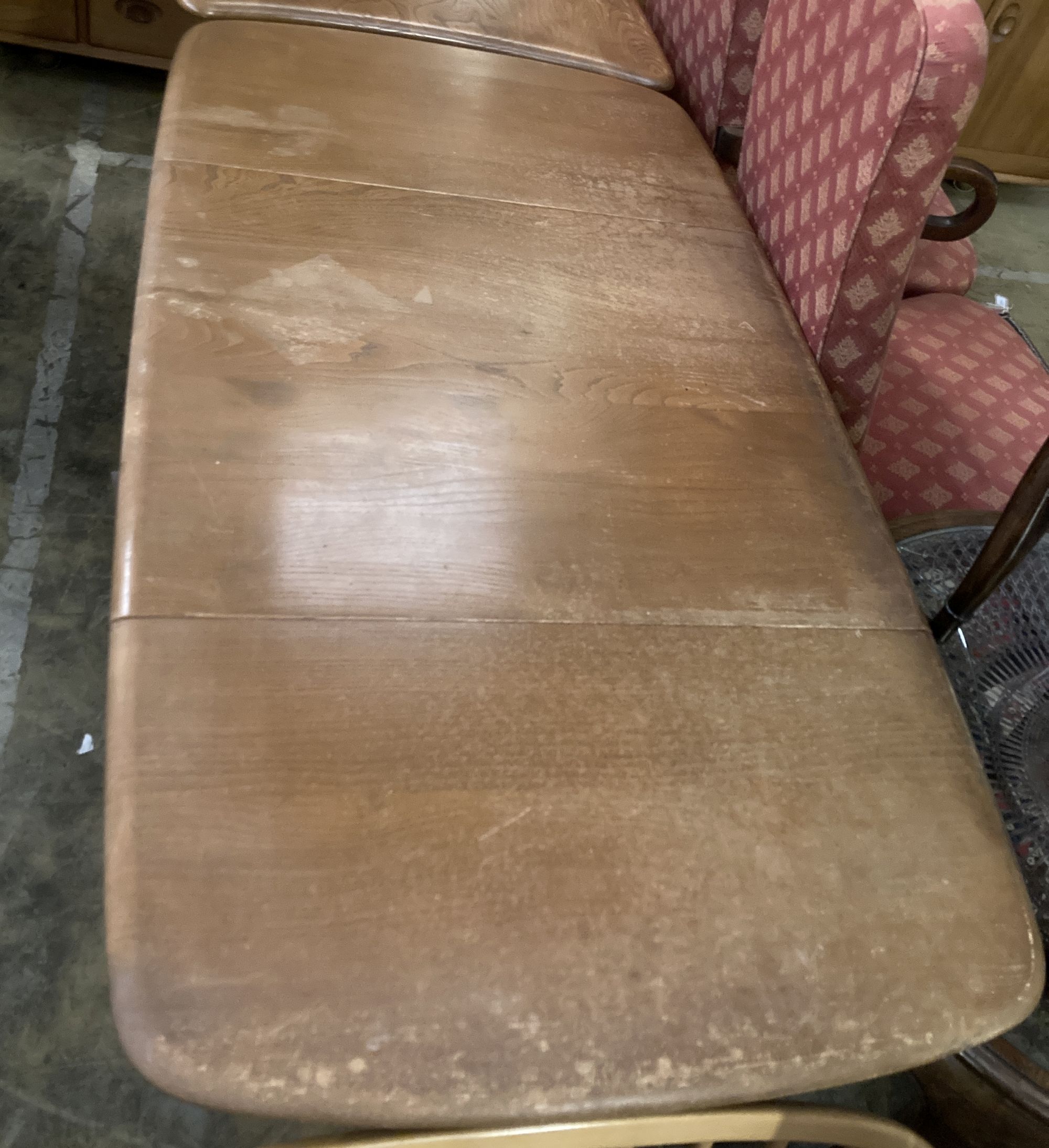 An Ercol elm drop-flap dining table, extended 130cm depth 74cm height 70cm